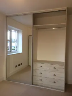 <p>2 door sliding wardrobe with double chest of drawers</p>
